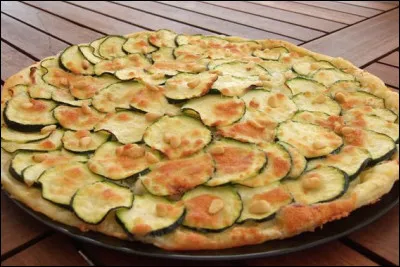 Ta maman prépare une tarte à la courgette.