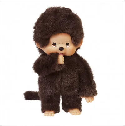 Quel est le nom de cette peluche représentant un petit singe avec une tête ronde et une tétine à la main ?