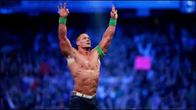 En quelle année John Cena a-t-il commencé sa carrière de catcheur et en quelle division ?