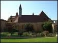 La cit doit sa renomme  ses trsors architecturaux : la faade de l'abbaye et ses dtails sculpts, le muse de la Soierie, la chapiteaux du couvent des Cordeliers, la vieille ville.