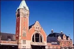 Vous pensez tre  Gdansk ? Non. Vous tes arrivs dans le dpartement du Haut-Rhin, et vous allez descendre sur les quais cette belle gare dont l'originalit rside dans son beffroi.