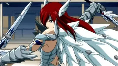 Comment s'appelle cette mage de rang S, membre de la guilde de Fairy Tail surnommée 'Titania' et utilise une magie qui permet d'invoquer des armures et des épées ?