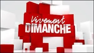 De quelle couleur est le canapé dans l'émission "Vivement Dimanche" ?