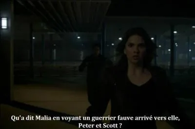 Qu'a dit Malia en voyant un guerrier fauve arrivé vers elle, Peter et Scott ?