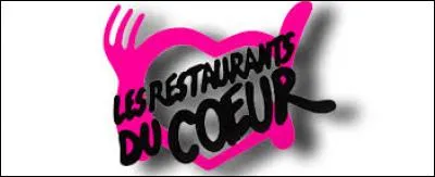 Qui a créé l'association "Les Restos du coeur" en 1985 ?