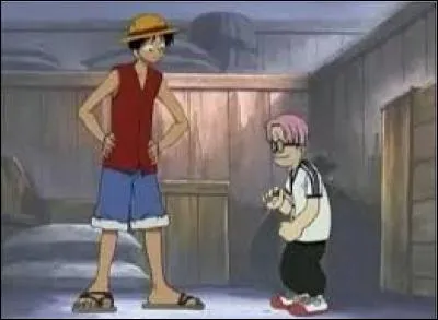 Comment s'appelle la première personne que Luffy (grand) a rencontrée ?